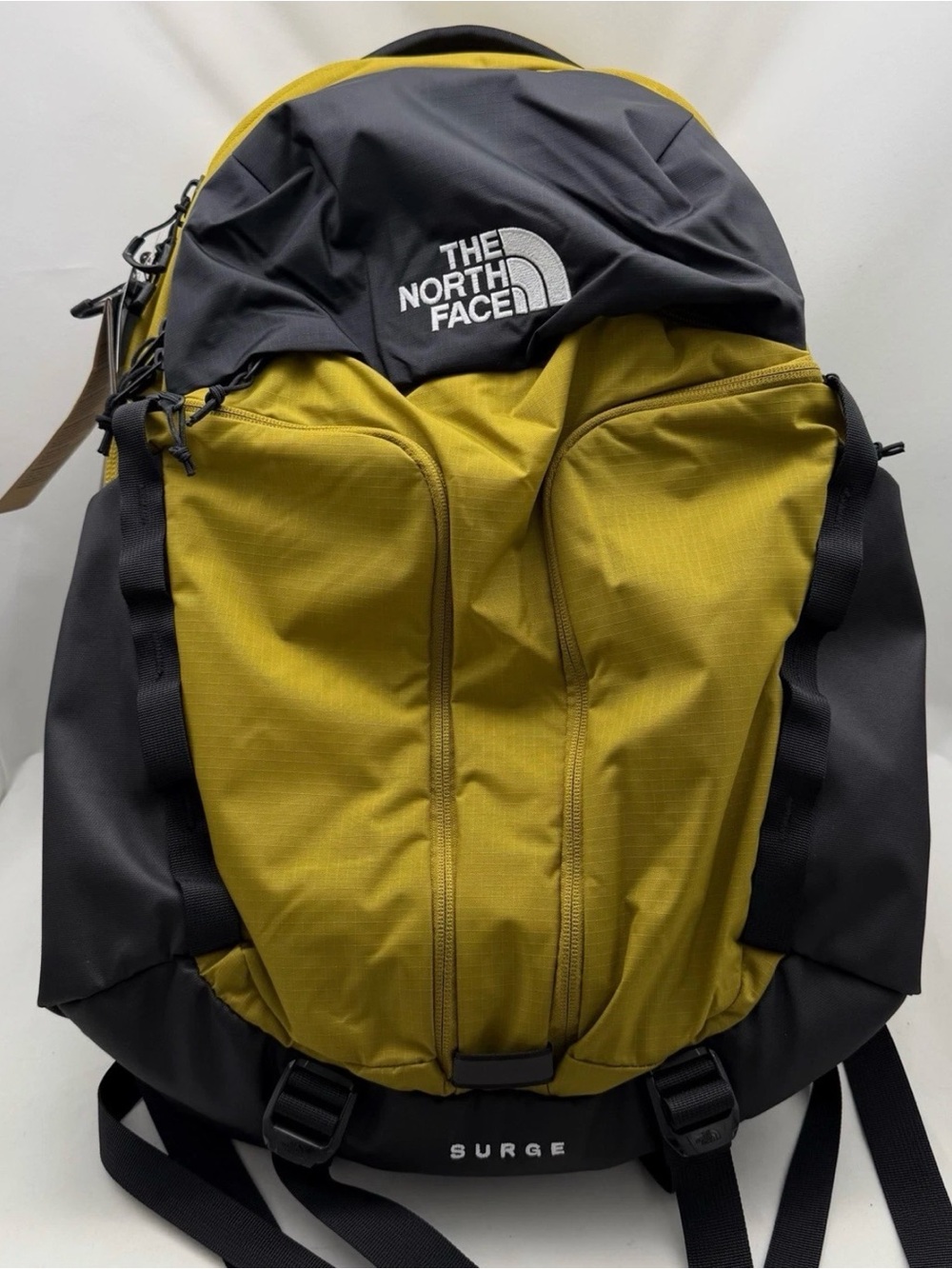The North Face Surge Backpack - Deep Dijon/TNF Black